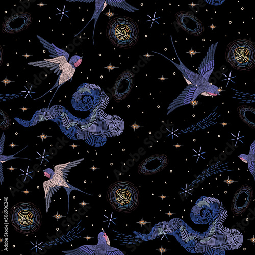 Embroidery seamless pattern with swallows and starry sky.