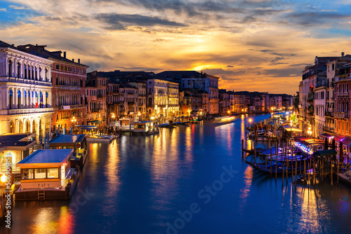 Beautiful night buildings in the Grand Canal in twilight  view from Rialto Bridge  Venice  Italy