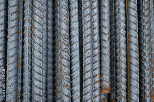 Steel rebar piles overlap for construction use.