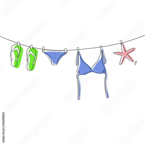clothes drying on a rope summer vacation swimsuit slippers sea