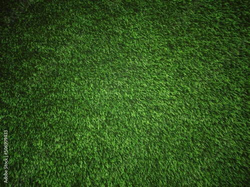 Top view of green artificial grass texture and background. Artificial turf grass for decorative in the garden, football field and golf course. Green backdrop and wallpaper. Copy space for your text.