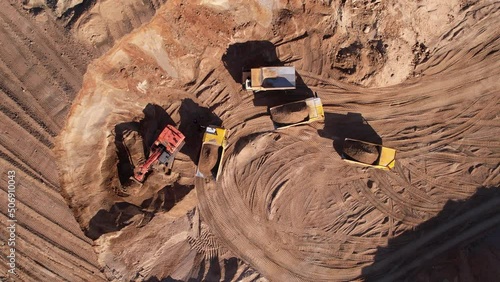 Wallpaper Mural Excavator load sand in mining truck. Mining Excavator in open pit. Sand Mining in quarry. Heavy machinery in opencast. Earth mover and Haul truck in open-pit. Sand, gravel and crushed stone operations Torontodigital.ca
