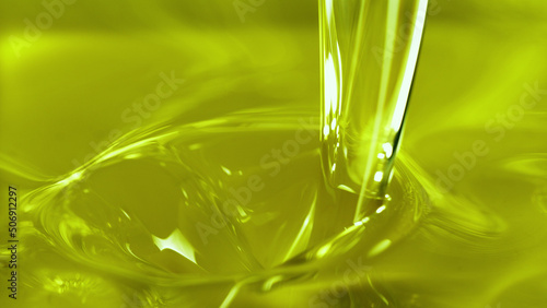 Pouring olive oil, closeup