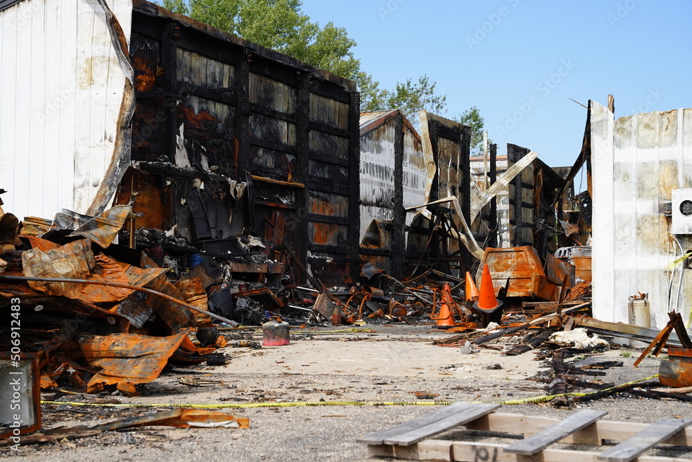 Fototapeta premium Burned building from a chemical fire out in the countryside.