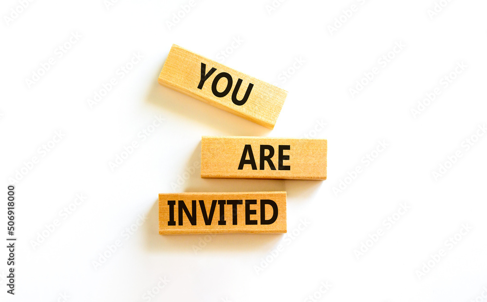 You are invited symbol. Concept words You are invited on wooden blocks. Beautiful white table white background. Business and you are invited concept. Copy space. You are invited symbol. Concept words You are invited on wooden blocks. Beautiful white table white background. Business and you are invited concept. Copy space.
