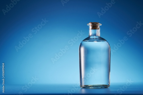 white vinegar against blue background