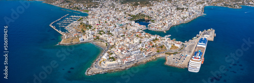 Agios Nikolaos, a picturesque coastal town with colorful buildings around the port in the eastern part of the island Crete, Greece