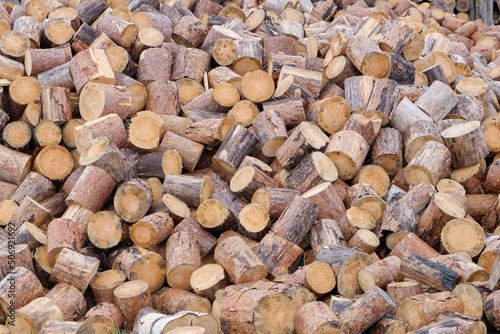 A huge pile of chocks, firewood, close-up