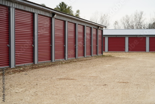 Red storage unit buildings site outside of Fond du Lac, Wisconsin holding owers property.