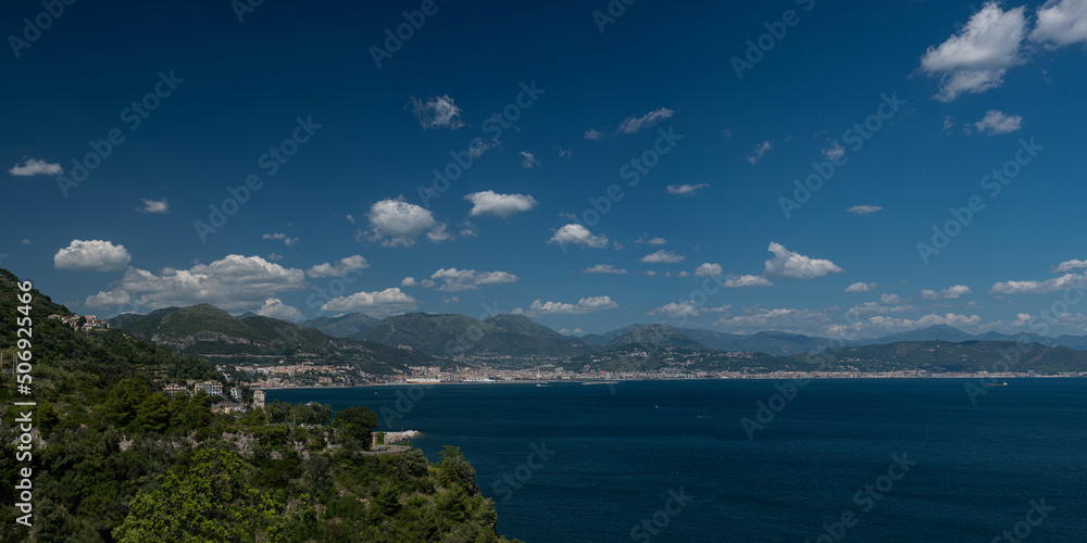 Fototapeta premium Seascape on the Amalfi Coast, Province of Salerno, Campania. Mountains, sea and blue sky with clouds. Southern Italy.