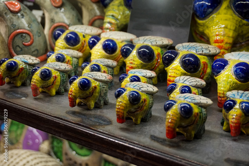  Yellow-blue statuettes on the counter in Lviv. Sale of souvenirs in Ukraine.      photo