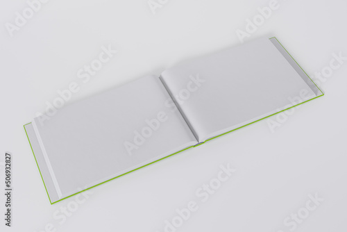 Mockup of a rectangular open book with a blank, glossy, green cover on white background. Isolated with clipping path.	