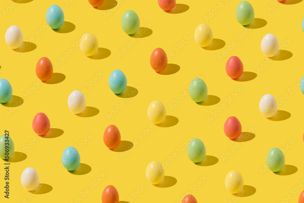 Easter eggs on yellow background. Easter minimal concept Easter eggs on yellow background. Easter minimal concept