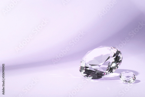 Lilac background for product presentation with diamonds. Minimal concept and hard sunlight.