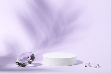 White podium with diamonds on a lilac background for product presentation. Minimal concept and hard sunlight.
