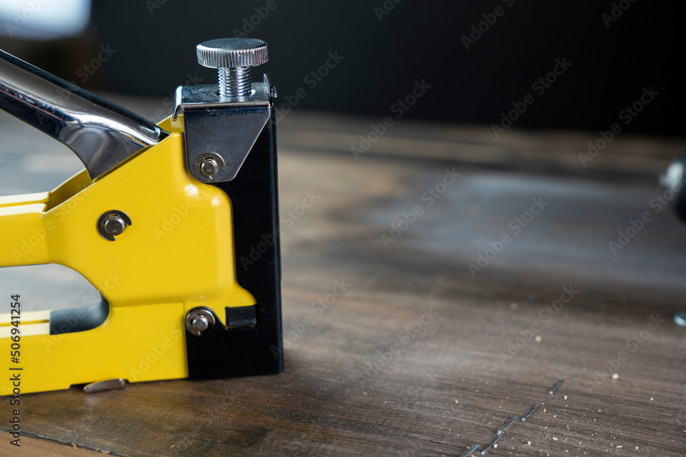 Flat lay composition on aged wooden background with different tools. Master equipment. Set of construction tools on wooden board Flat lay composition on aged wooden background with different tools. Master equipment. Set of construction tools on wooden board