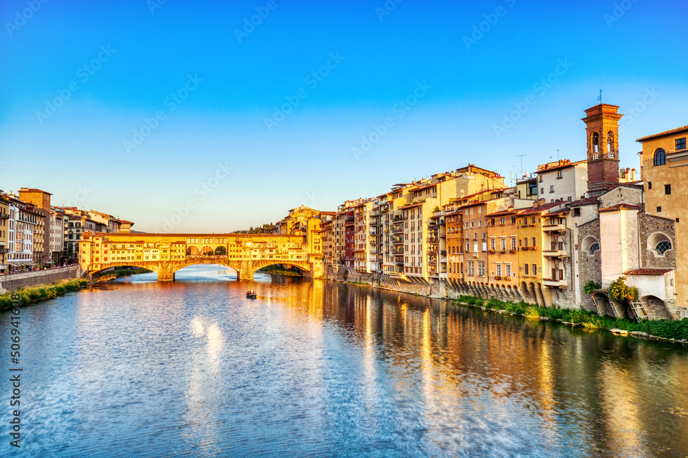 Golden Sunset over Ponte Vecchio Bridge with Reflection in Arno River, Florence