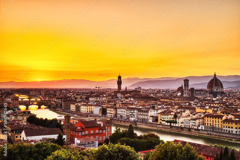 Florence Aerial View at Golden Sunset over Ponte Vecchio Bridge, Palazzo Vecchio and Cathedral of Santa Maria del Fiore with Duomo