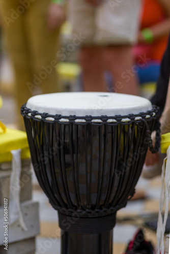 Wallpaper Mural White bongo drum with black fabric wrap. Yoga Festival. Torontodigital.ca