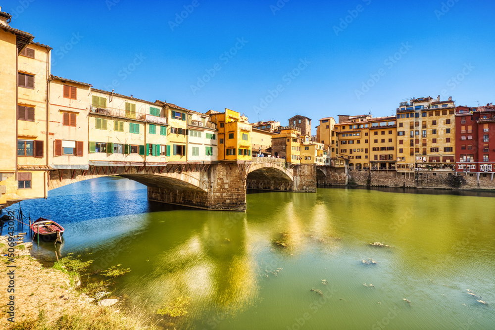 Ponte Vecchio Bridge during Beautiful Sunny Day with Reflection in Arno River, Florence