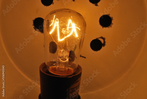 tungsten bulb on, dim light