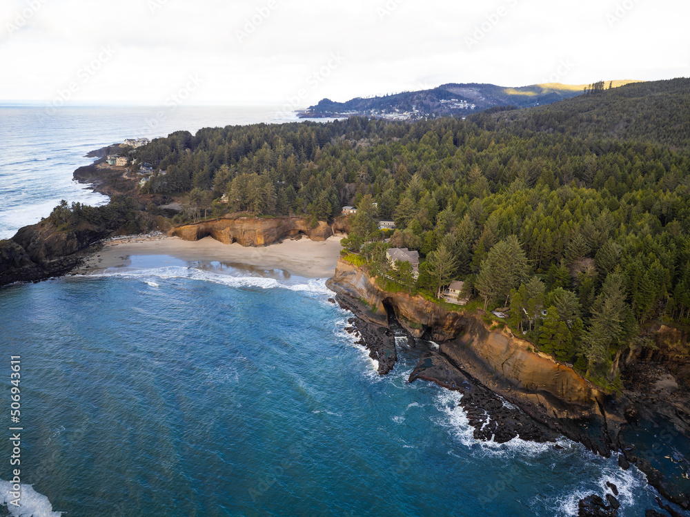 Panoramic shot. Paradise place. Very beautiful landscape. Bright blue sea water. Hilly coast and pine forest. Beauty of nature, calm scenes, rest, relaxation, travel.