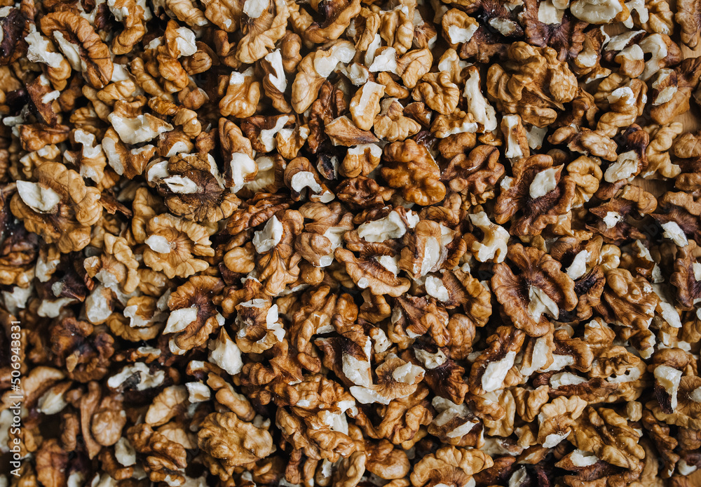 Background, texture of brown walnuts, hazelnuts. Food photography, top view. Background, texture of brown walnuts, hazelnuts. Food photography, top view.