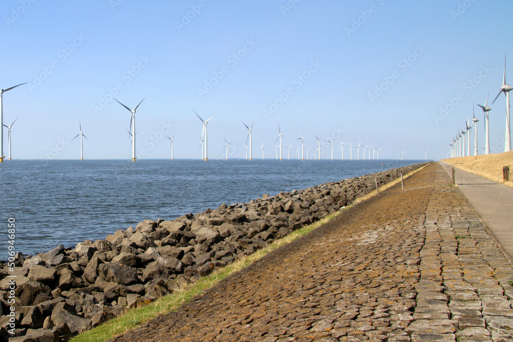 Modern wind turbines in the Noordoostpolder in the Netherlands