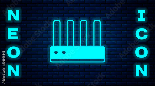 Glowing neon Router and wi-fi signal icon isolated on brick wall background. Wireless ethernet modem router. Computer technology internet. Vector