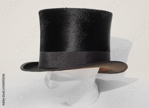 Cylinder hat. High black hat. Dandy style. Capotain. photo