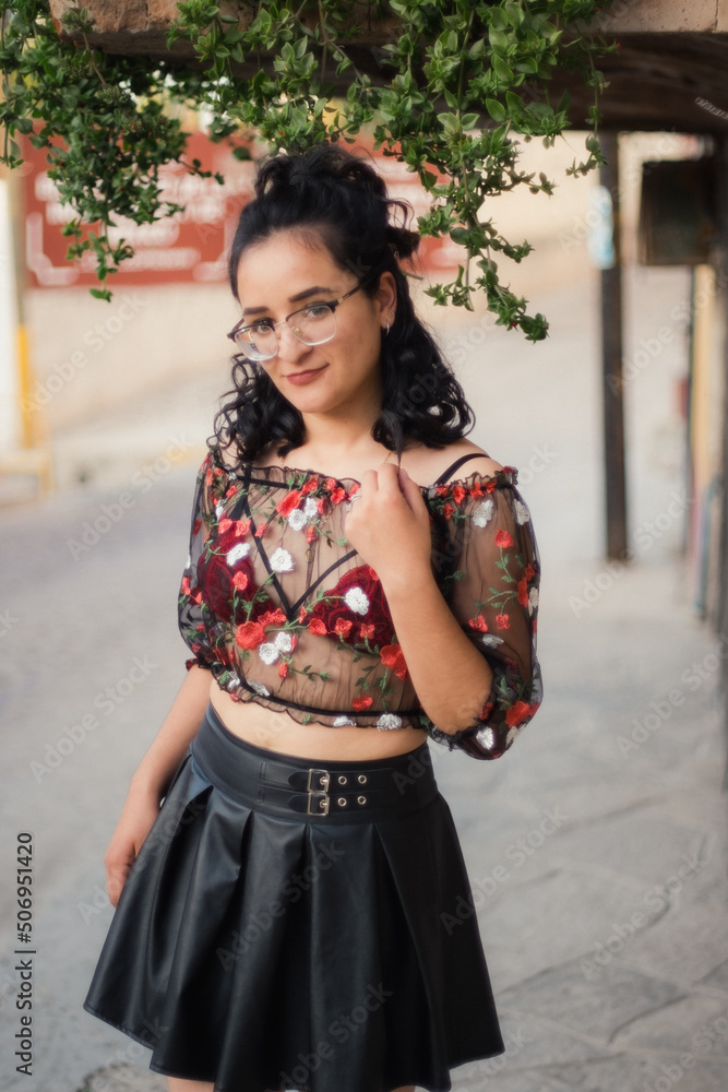 Pretty Latina poses in a see-thru top with a red bra Pretty Latina poses in a see-thru top with a red bra
