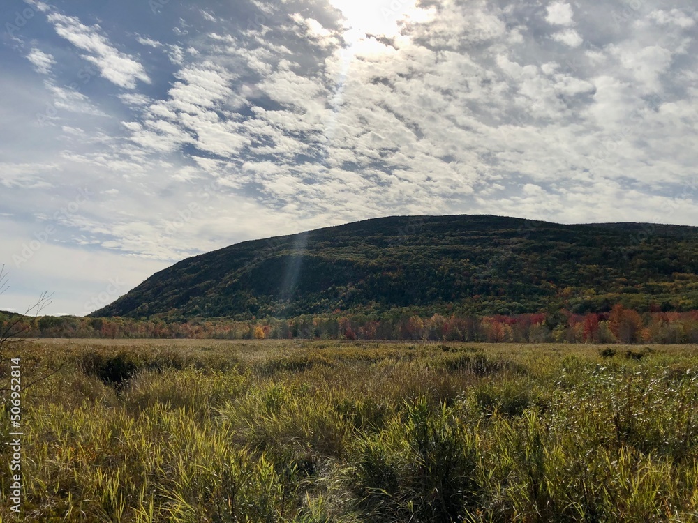 fall landscape with clouds and mountains