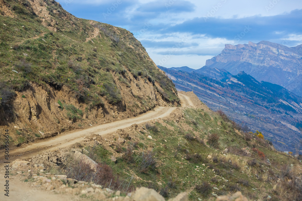 Serpentine road to the village of Goor, Dagestan, Russia. A sharp turn in the road. Beautiful girt road in the mountains. Beautiful landscape Serpentine road to the village of Goor, Dagestan, Russia. A sharp turn in the road. Beautiful girt road in the mountains. Beautiful landscape