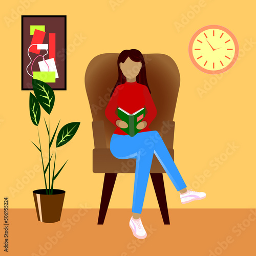 GIRL IN THE CHAIR. Girl sitting in a chair and reading a book