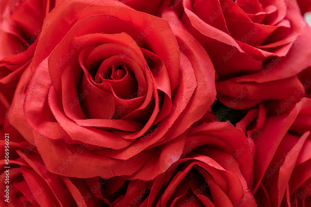 Close-up shot of an artificial flower bouquet of red roses Close-up shot of an artificial flower bouquet of red roses