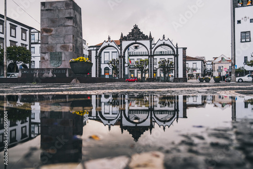 Portas da Cidade reflection after the rain, in Ponta Delgada photo