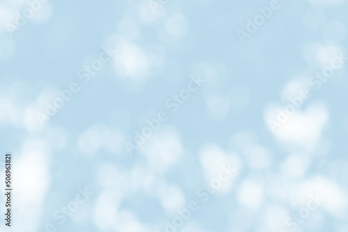 Abstract light blue blur bokeh for background, light blur on high light blue gradient abstract background in central design for presentation.