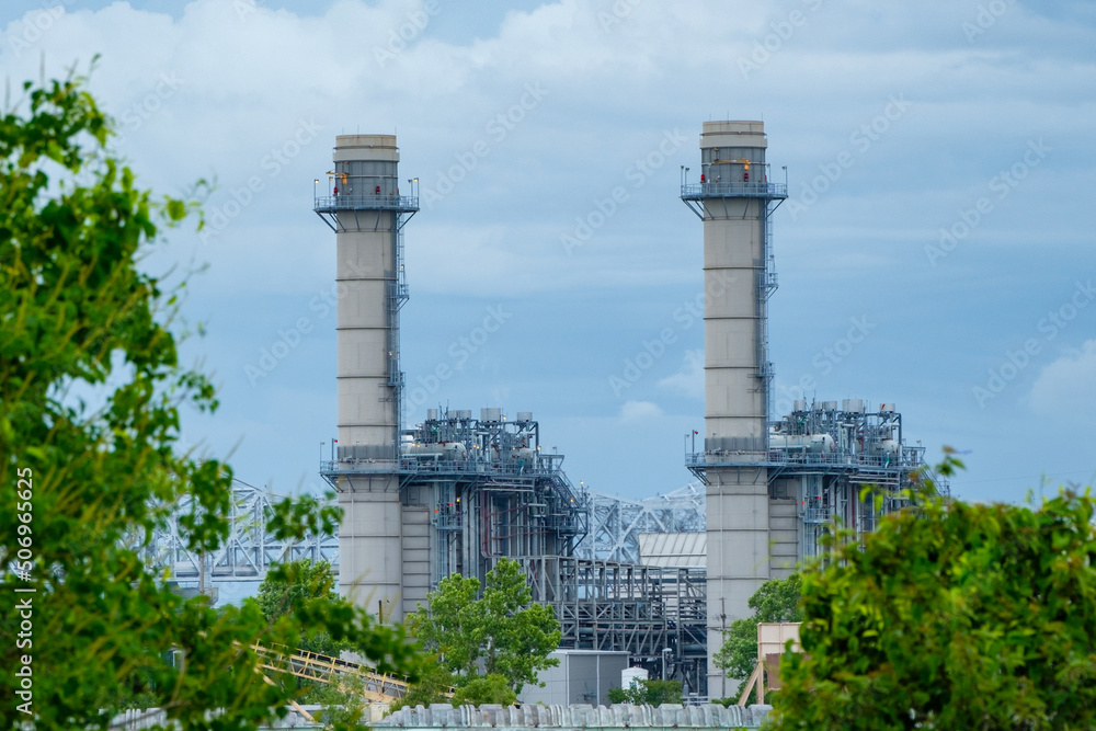 Obraz premium Smokestacks for an Industrial Plant along the Mississippi River in Louisiana