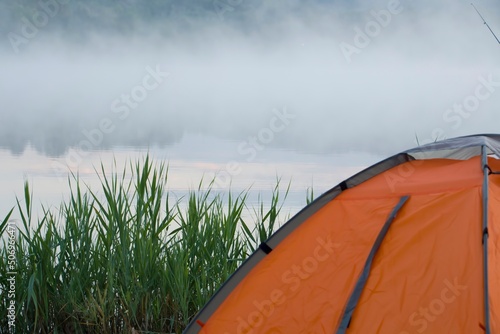 Camping tent by the lake