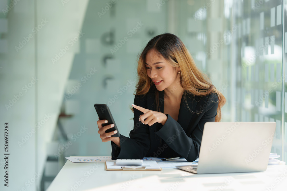A businesswoman completes KYC using an online banking program in order to open a digital savings account. The definition of cyber security. A businesswoman completes KYC using an online banking program in order to open a digital savings account. The definition of cyber security.