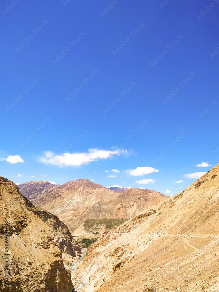 Beautiful Himalayan landscape of Spiti valley with blue sky and clouds Beautiful Himalayan landscape of Spiti valley with blue sky and clouds