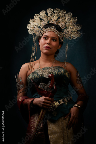 Che Siti Wan Kembang was a legendary queen who reigned over a region on the east coast of Peninsular Malaysia, now located within the Malaysian state of Kelantan. She ruled in 1610–1667. photo