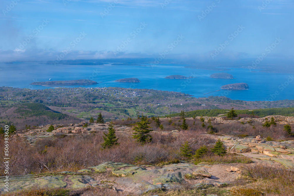 Acadia National Park aerial view including Bar Harbor town, Bar Island and Porcupine Islands on top of Cadillac Mountain in Maine ME, USA.  