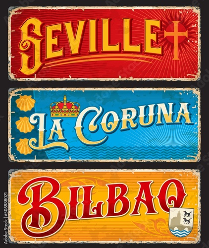 Seville, La Coruna, Bilbao Spanish travel stickers and plates, vector luggage tags. Spain cities landmarks on tin signs and grunge plates with state flags, symbols and emblems of Basque country