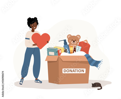 Donation box with clothes, toys, books and medicines. African volunteer woman holding in hands heart. Share your love. Support for poor people and children. Vector illustration in flat cartoon style.