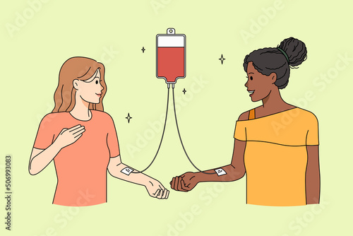 Happy kind donors give blood in hospital