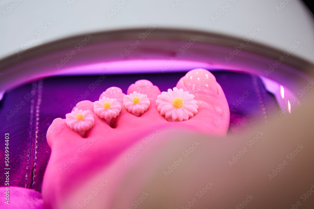 Pedicure in progress, drying for nails and gel polish in a pedicure