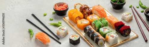 Sushi assortment on light background.