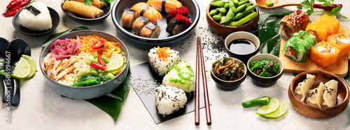 Japanese food assortment on light background.