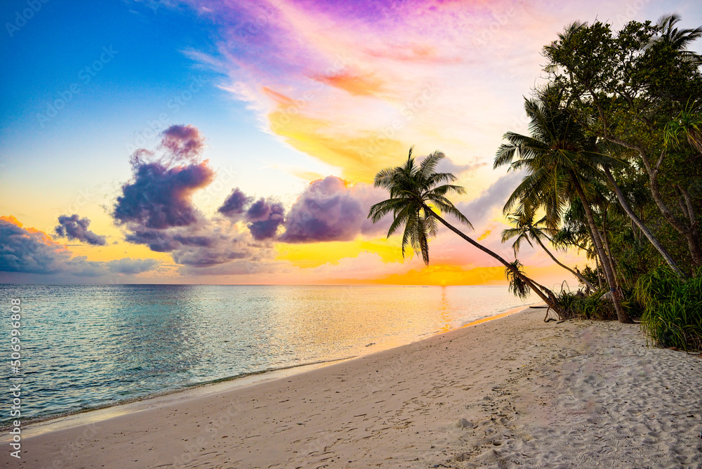 Beautiful evening sunset on the coast of the island. Maldives.